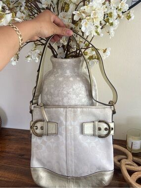 Coach Metallic-Trim Signature Crossbody in Light Beige and Gold